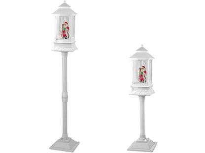 Vánoční lampa lucerna se Santa Clausem – bílá s padajícím sněhem