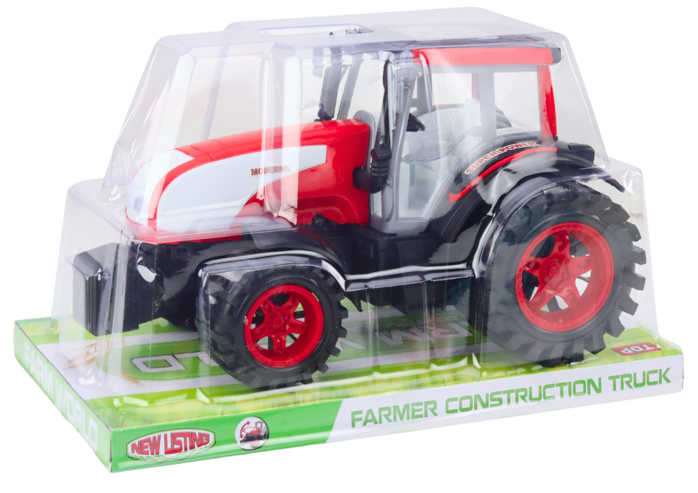 Velký zemědělský traktor s pohonem červený