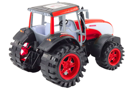 Velký zemědělský traktor s pohonem červený